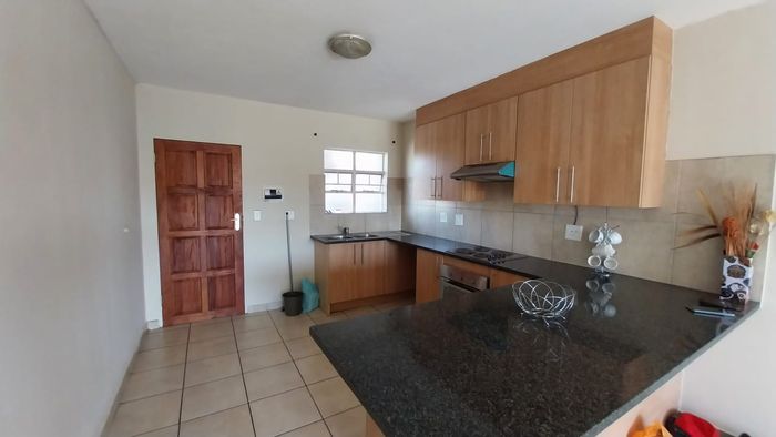 Annlin Apartment To Rent: Open-plan living, two bedrooms, secure parking, pre-paid electricity.