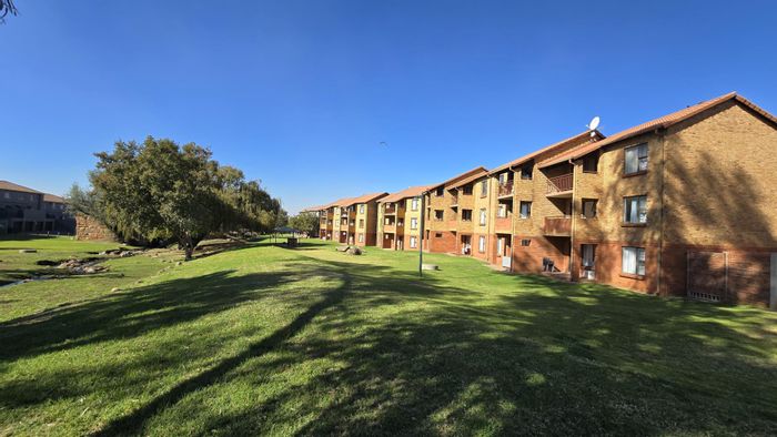 2-Bedroom Apartment For Sale in Castleview with pool, park views, and parking.