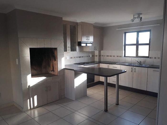 Townhouse for Sale in Walvis Bay Central: 2 beds, garage, courtyard, security features.