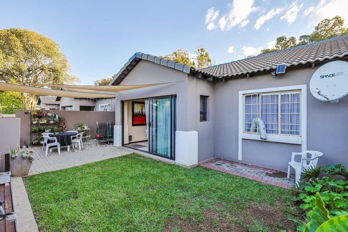 For Sale: Equestria Townhouse with 3 bedrooms, double garage, and garden braai.