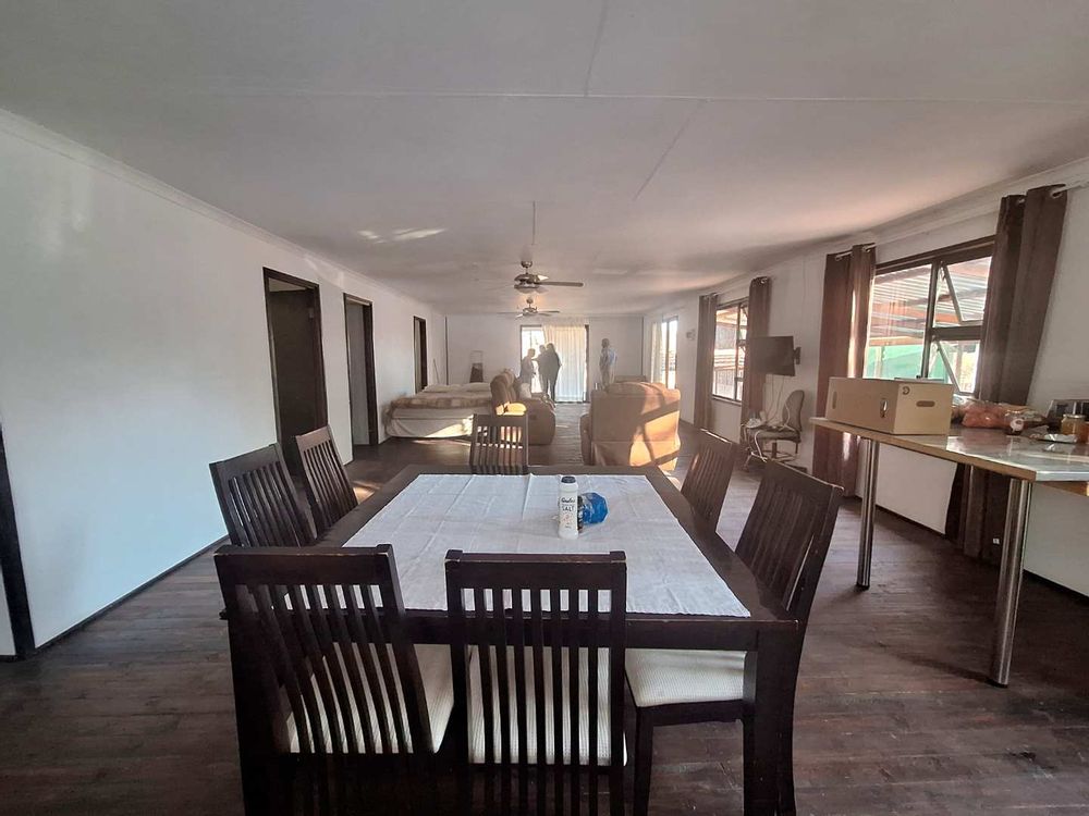 Open plan kitchen with dining room and lounge