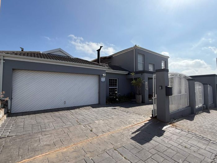 Spacious 5-bedroom house with pool, garden, and double garage in West Beach. To Rent.