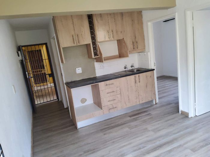 For Sale: 2-Bedroom Apartment in Amalinda with security, laundry area, and nearby amenities.