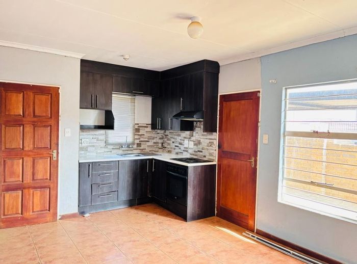 3-Bedroom House For Sale in Randfontein South with garden and carport.