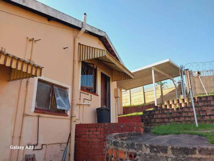 3-Bedroom House For Sale in Umlazi Bb with garage, carport, and nearby amenities.