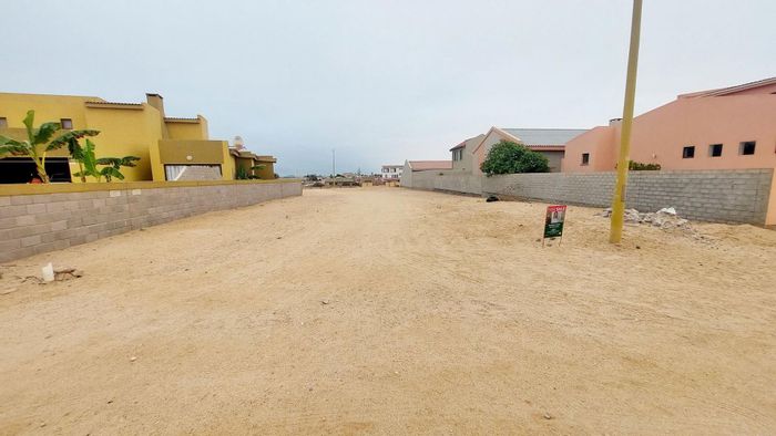 Vacant land for sale in Henties Bay Central, near the sea with boundary walls.