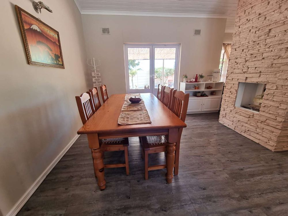 Open plan dining room with double sided fire place.