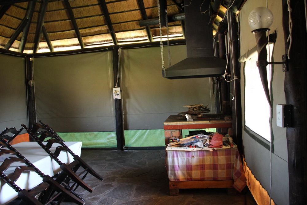 Outdoor/ enclosed entertainment room with indoor BBQ