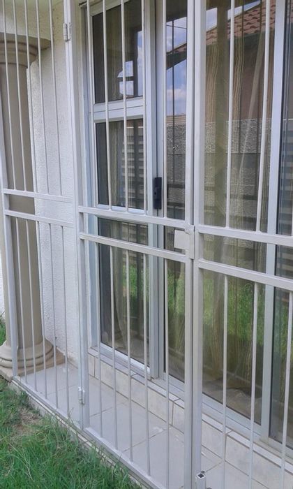 Four-bedroom house for sale in The Orchards with garage and security features.