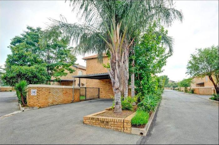 For Sale: 2-Bedroom Townhouse in Roodepoort Central with private patio and pet-friendly garden.