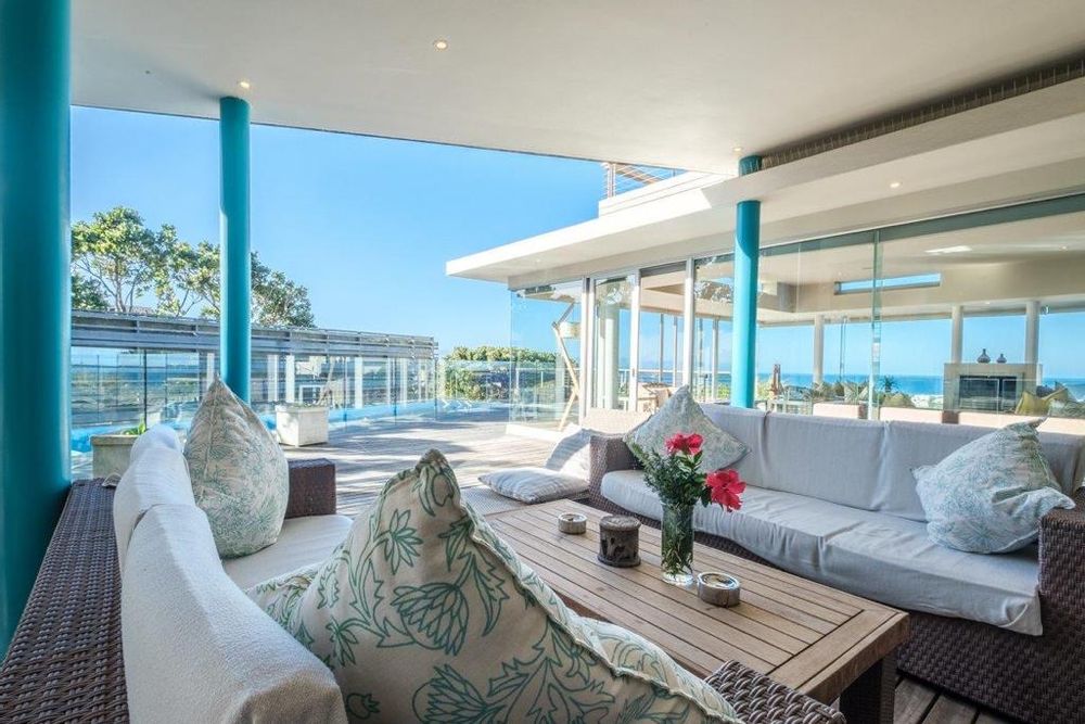 Lounge on deck overlooking the swimming pool
