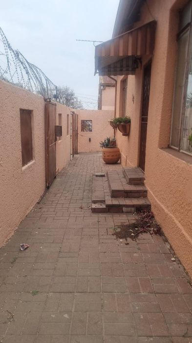 9-Bedroom House For Sale in Forest Hill with rental income potential and parking.