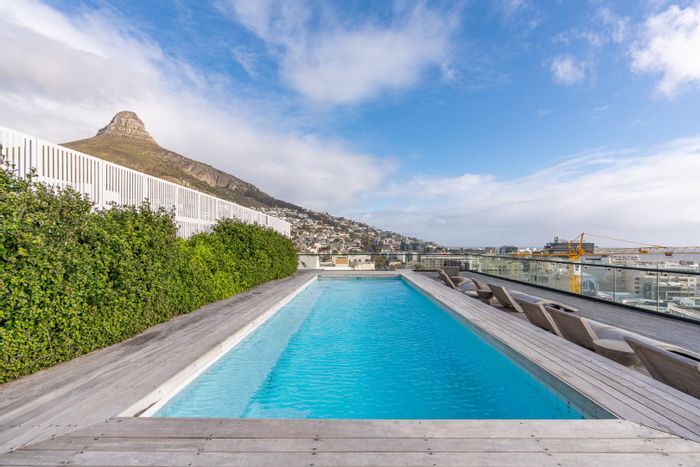 Sea Point Apartment For Sale: Balcony, co-working spaces, rooftop pool, and vibrant amenities.