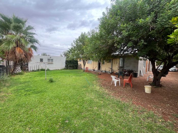Blydeville House For Sale: Spacious family home with two rental flats and large yard.
