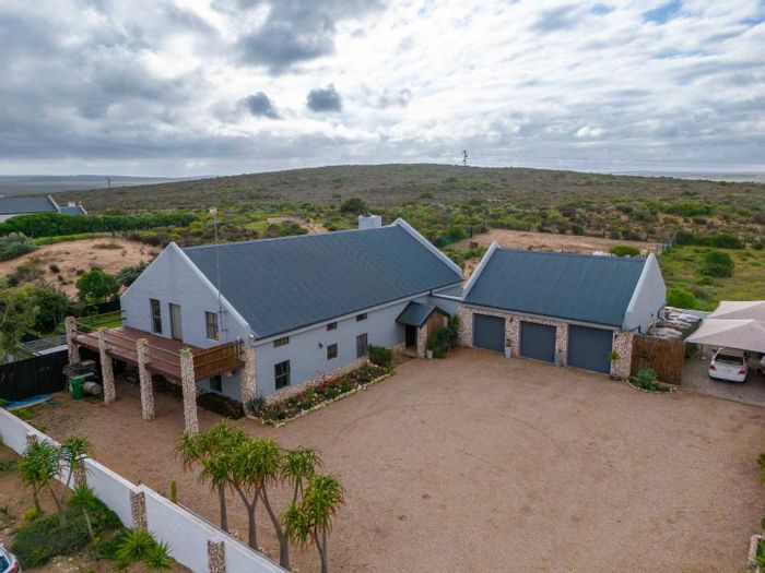 For Sale: House in Long Acres Country Estate with pool, garages, and panoramic views.