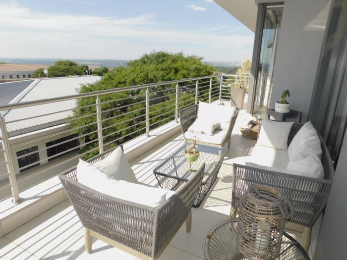 Bryanston Apartment To Rent: 2-bed penthouse, secure, inverter, balcony views, pet-friendly.