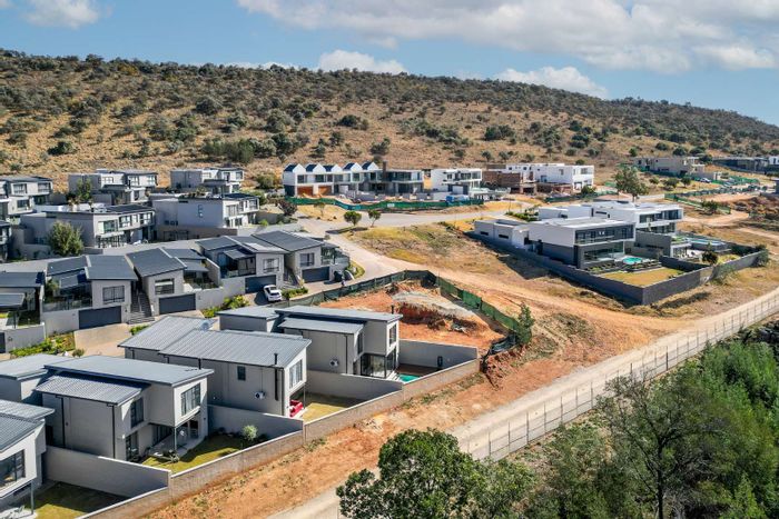 Prime vacant land for sale in Eye of Africa with approved architectural plans.