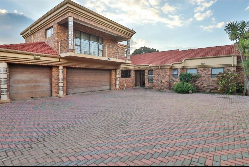 3 garages with a spacious front 