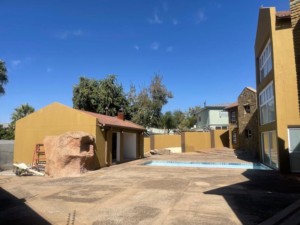 Left is an entertainment area and right is the main house