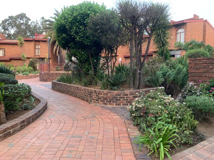 For Sale: Townhouse in The Hill with garden, pool, and 24/7 security.