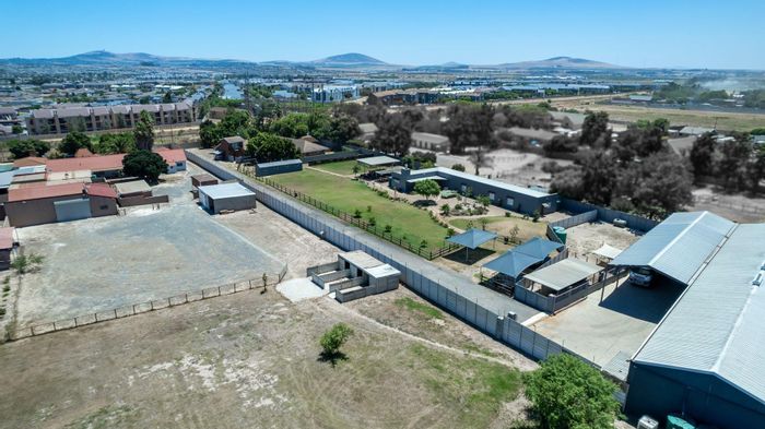 Commercial Opportunity in Joostenbergvlakte: Two Homes, Warehouse, and Future Development Potential!