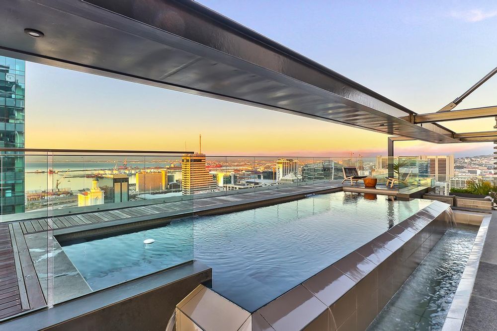 Sunset on 27th floor pool deck with private bar and spectacular views
