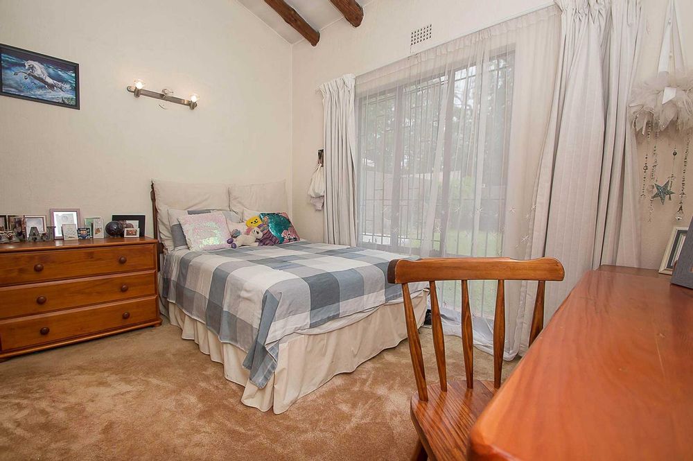 2nd Bedroom is very well sized with large windows and views out to garden 