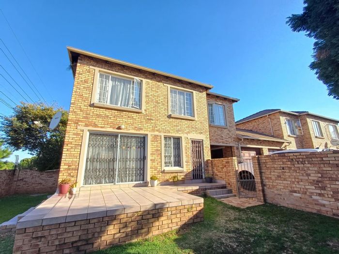 For Sale: 3-Bedroom Apartment in Olivedale with garden, double garage, and secure access.