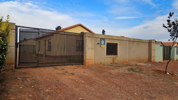 Two-Bedroom House for Sale in Protea Glen with Spacious Yard and Security Features