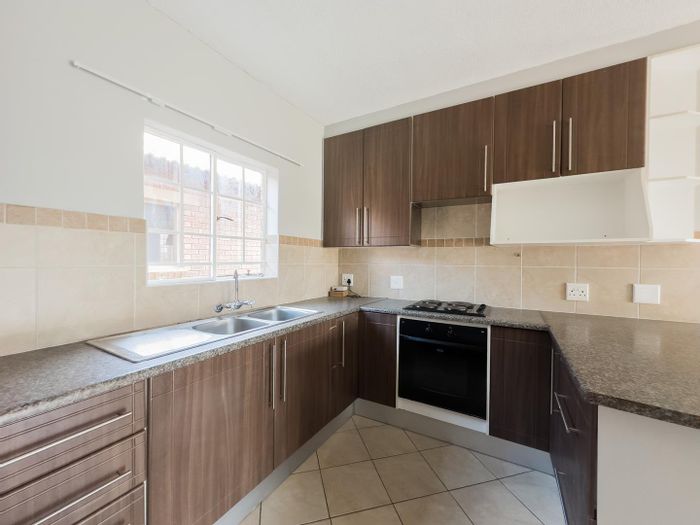 2-Bedroom Townhouse To Rent in Mooikloof Ridge with private garden and clubhouse amenities.