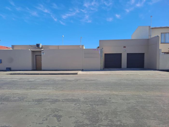 For Sale: House with 3 Bedrooms, 2-Bedroom Flat, and Entertainment Areas in Walvis Bay Central.