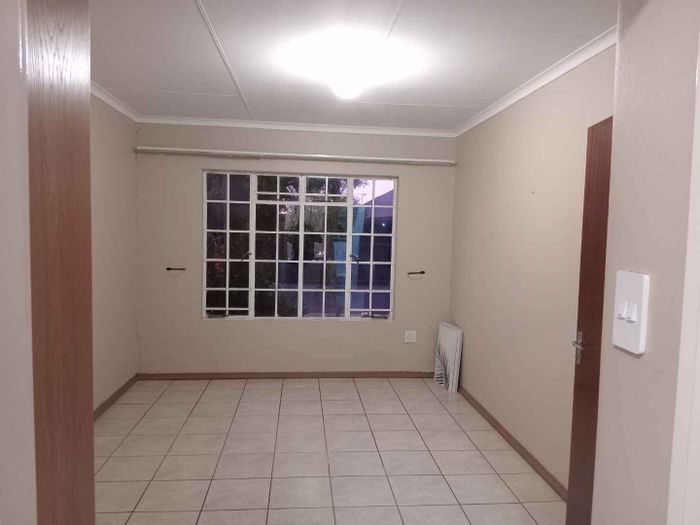 3-Bedroom Townhouse for Sale in Theresapark with Garden, Garage, and Guest Suite Potential.