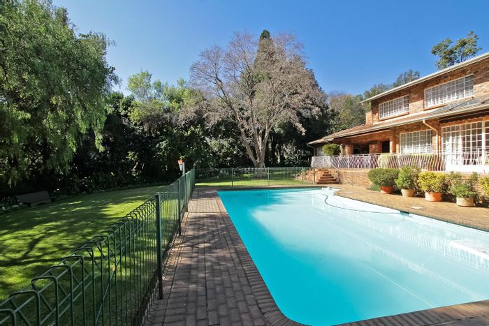 For Sale: Spacious Morningside house with pool, patio, and extensive parking.