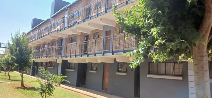 For Sale: 2-bedroom apartment in The Orchards with garage, near amenities.