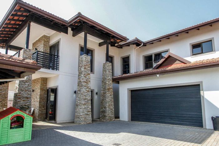 For Sale: House in Izinga Estate with pool, bar, and staff accommodation.
