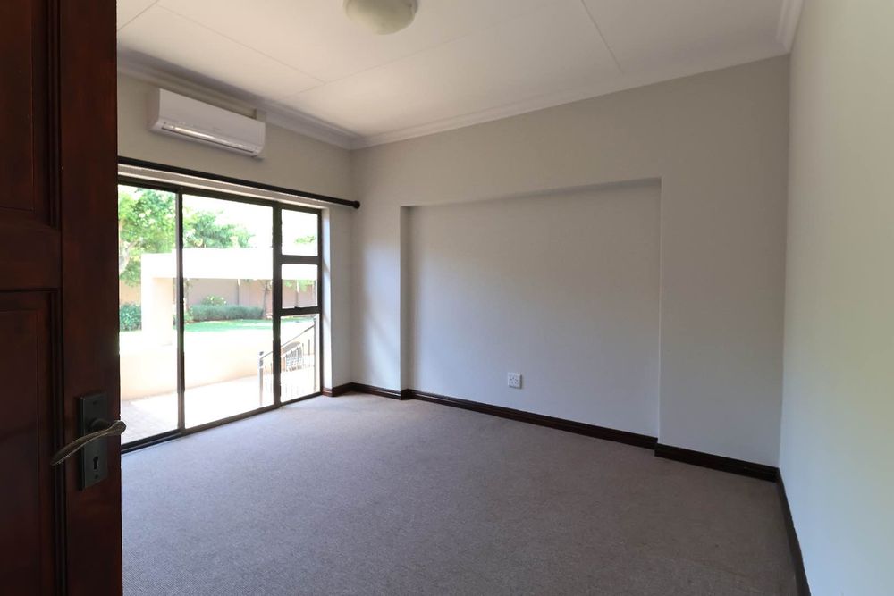 1st Bedroom with sliding door to garden