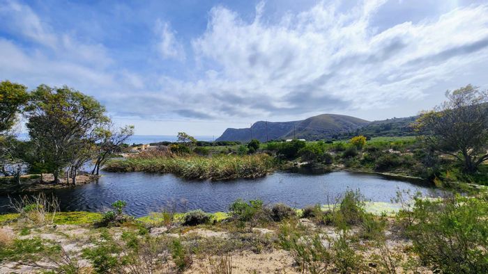 Farm for Sale in Uilenkraalsmond: Water resources, dual power, versatile infrastructure.