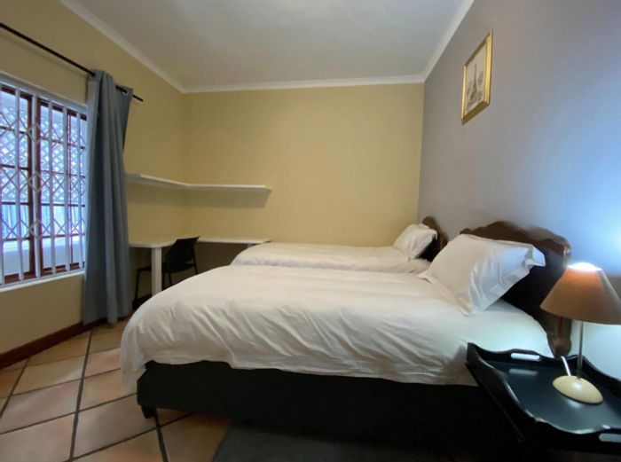 House to Rent in Zonnebloem: Furnished room, communal spaces, utilities included.