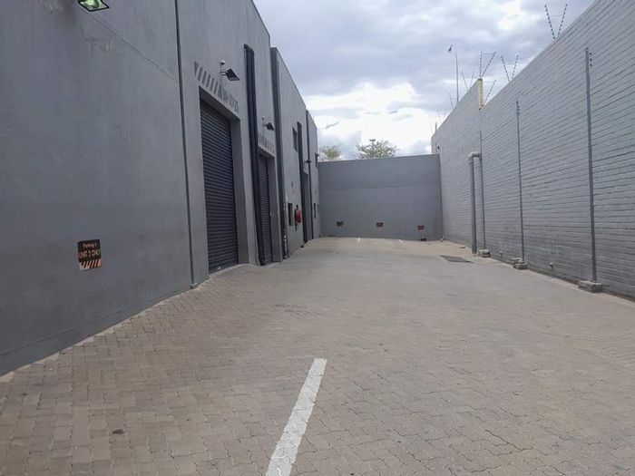 For Sale: Northern Industrial Business with double storey, kitchen, office, and parking.