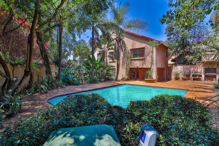 For Sale: Spacious Bryanston house with pool, cottage, and established gardens.