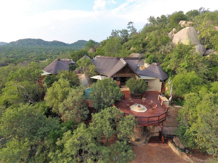 Leopard Rock House For Sale: Stunning Bush Home with Pool, Bar, and Guest Suites