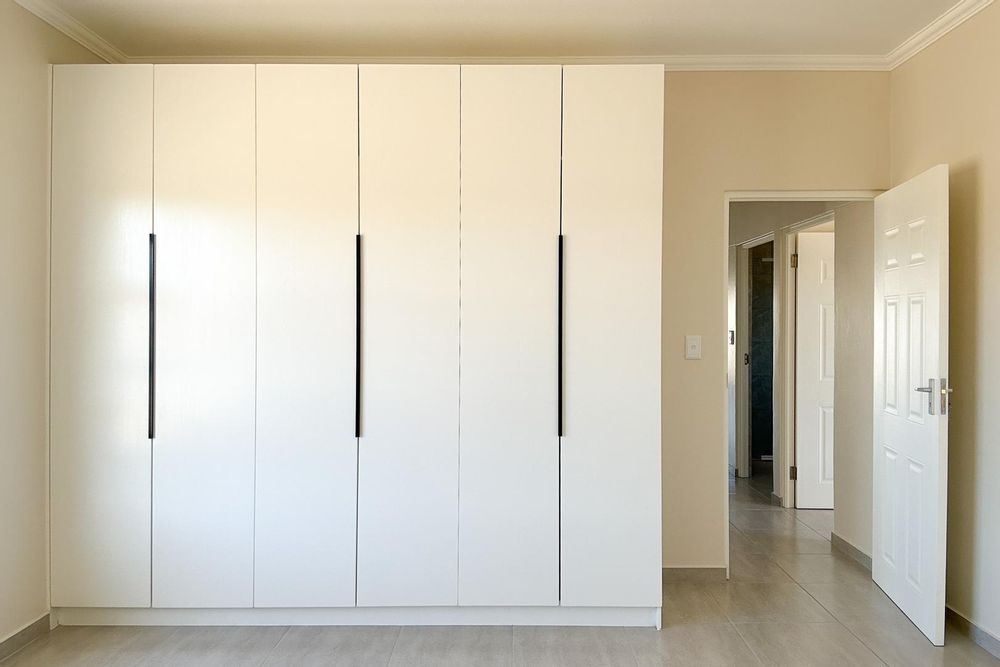 Main bedroom with plenty of cupboards and ensuite bathroom.