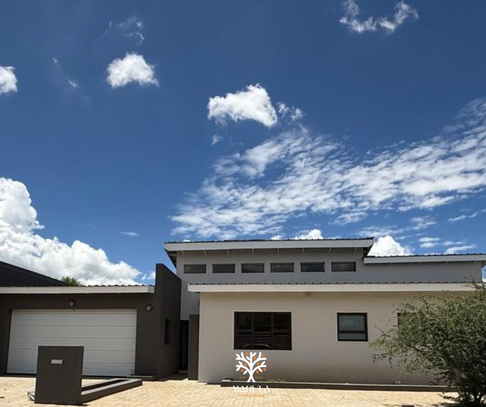 For Sale: House in Finkenstein with pool, BBQ area, and spacious living.