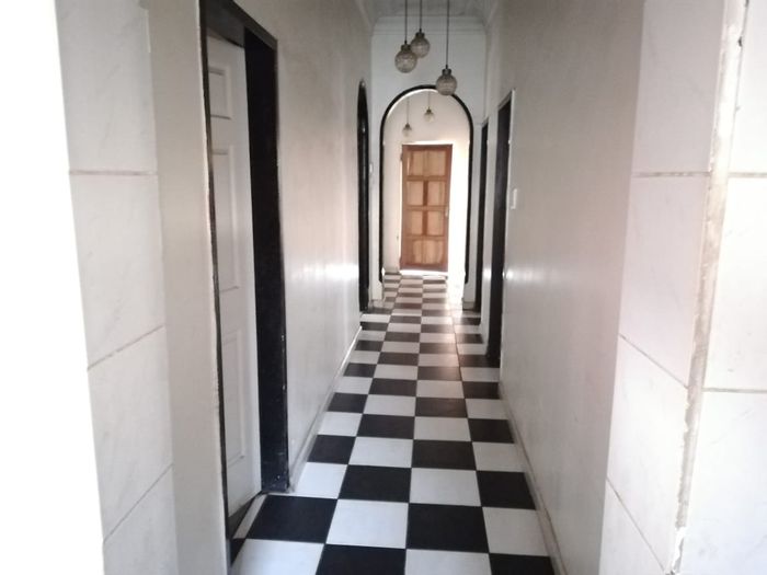 Turffontein House For Sale: 3 bedrooms, flatlet, garden, and great transport access.
