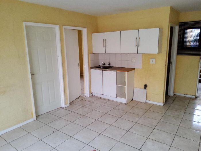 2-Bedroom Apartment For Sale in Amalinda with security, parking, and amenities nearby.