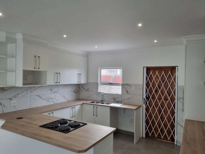 For Sale: Apartment in Sunnyridge with 2 bedrooms, open parking, and secure complex.