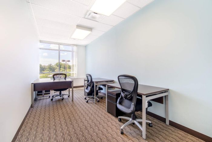 Flexible office space for rent in Parktown, includes shared amenities and parking.