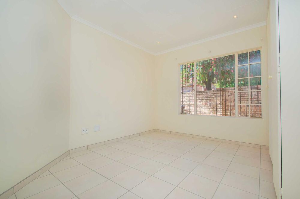 Well sized main bedroom with garden views