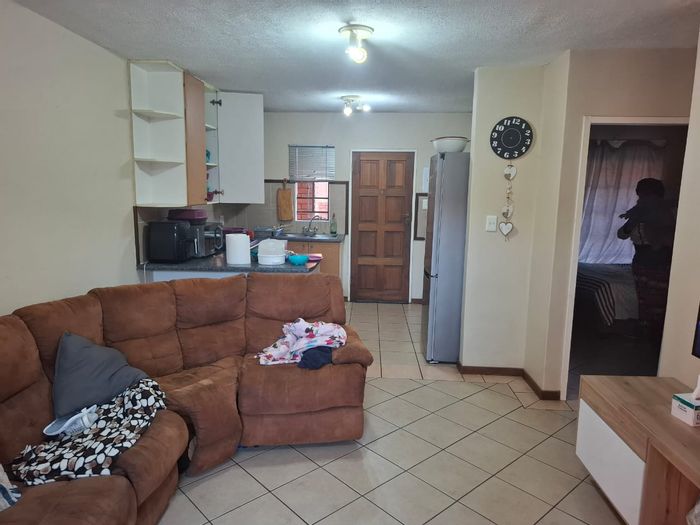 2-Bedroom Apartment To Rent in Mooikloof Ridge with private garden and estate amenities.