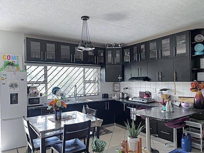 For Sale: 4 Bedroom House in Rocky Crest with rental flat and balconies.